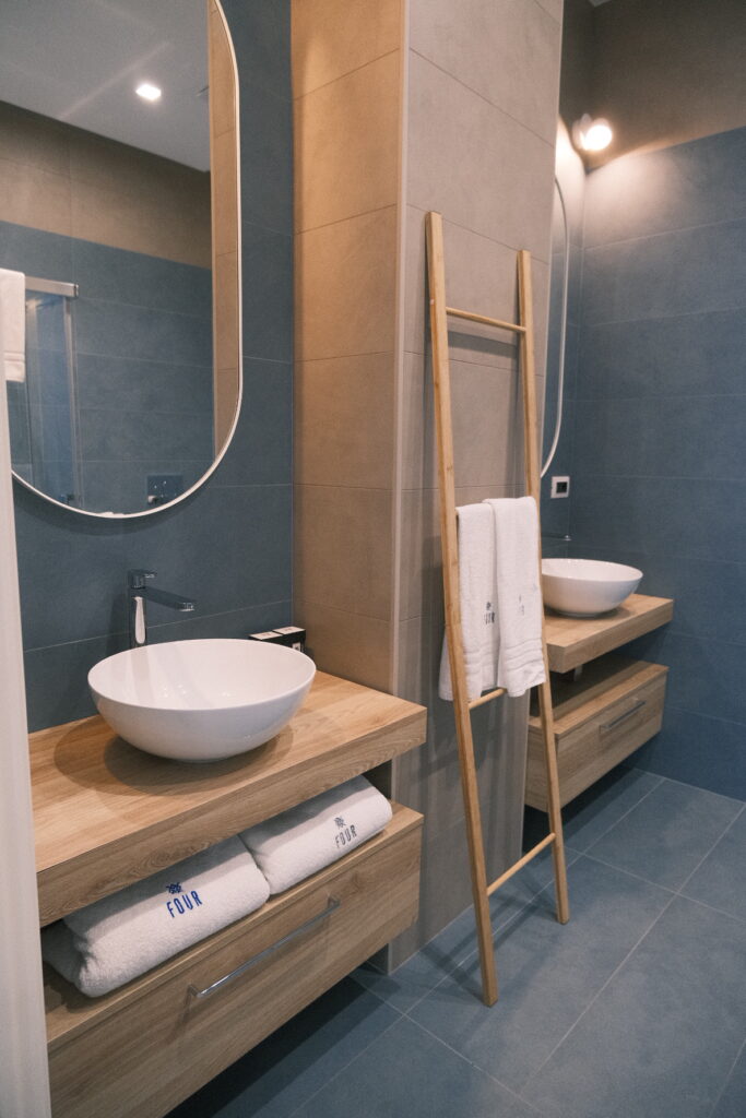 A gigantic bathroom including a rain shower