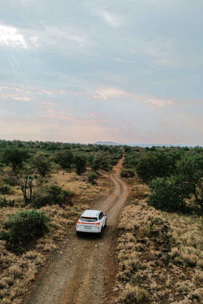 Car cruising through Pongola Game Reserve